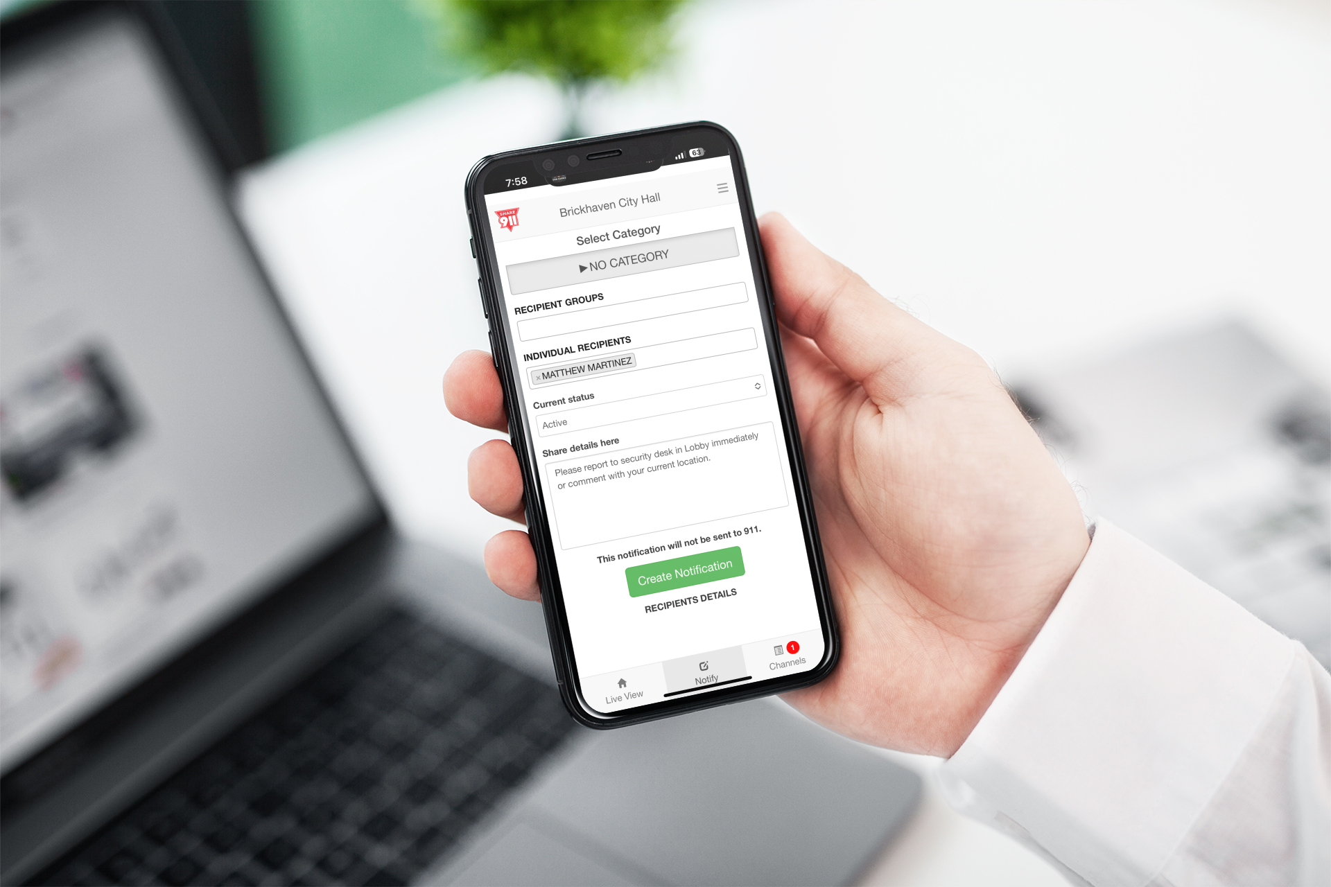 mockup-of-an-iphone-11-on-the-hand-of-a-man-in-his-office-2118-el-1